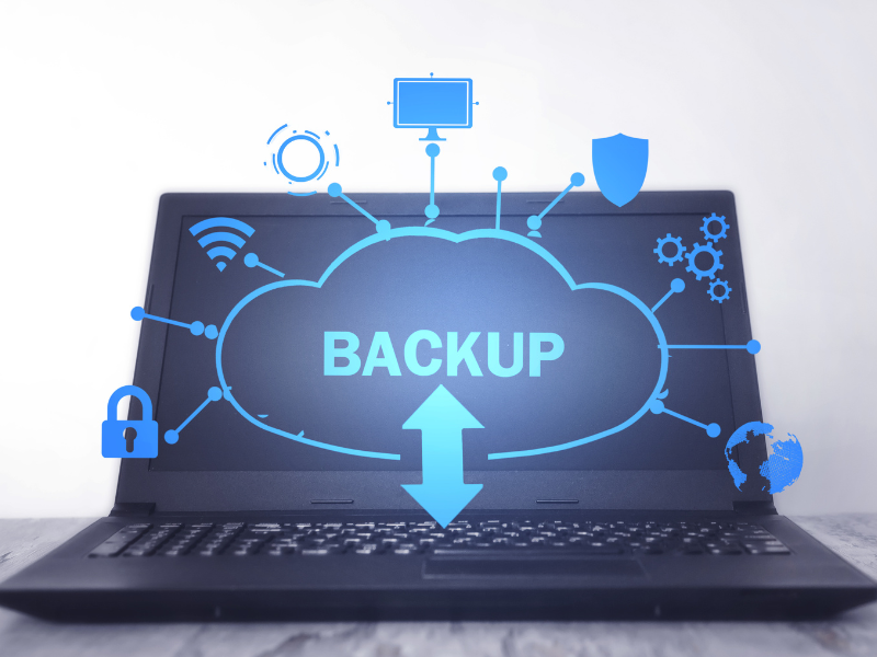 Image of a laptop displaying an IT Backup solution graphic