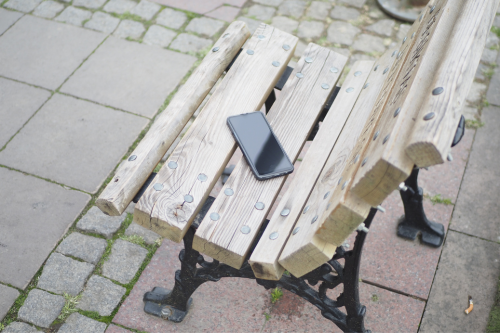 Image of a phone left on a bench | Device Security